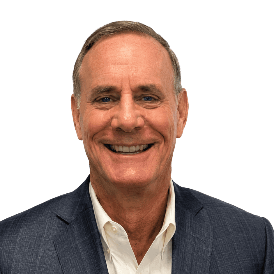 Professional businessman in a suit smiling, representing franchising success and business growth.